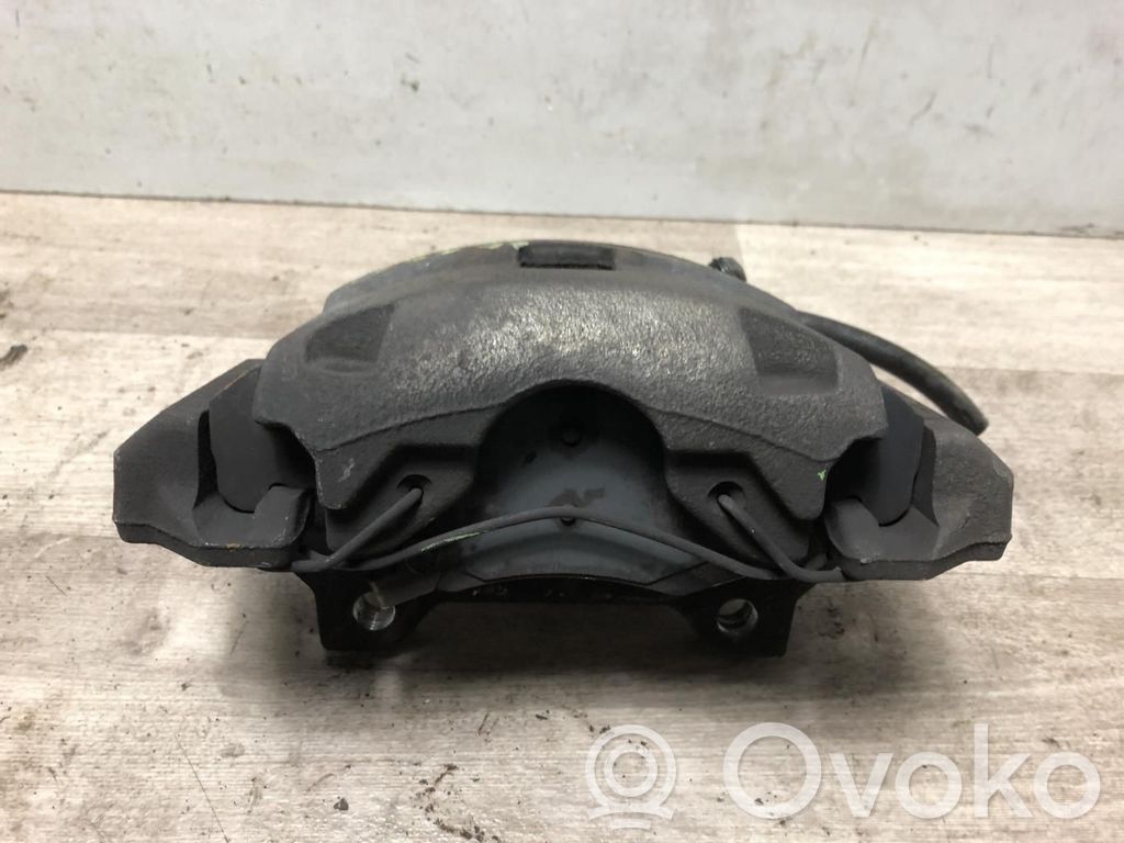Opel Corsa E Front brake caliper 