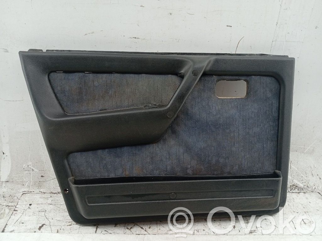 Front door card panel trim