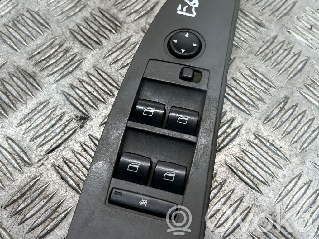 Electric window control switch   6939092