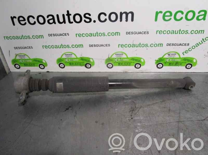 Opel Corsa D Aizmugurē amortizators 
