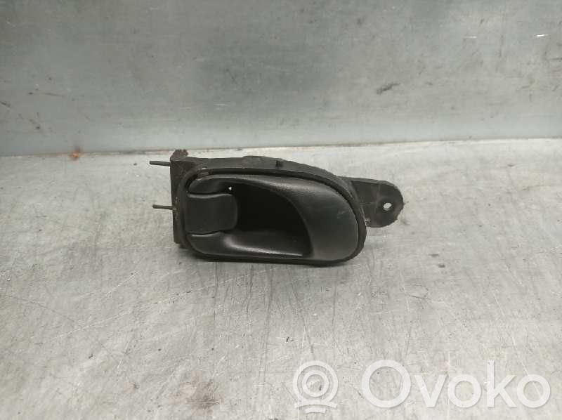 Daewoo Tacuma Manecilla interna puerta delantera 