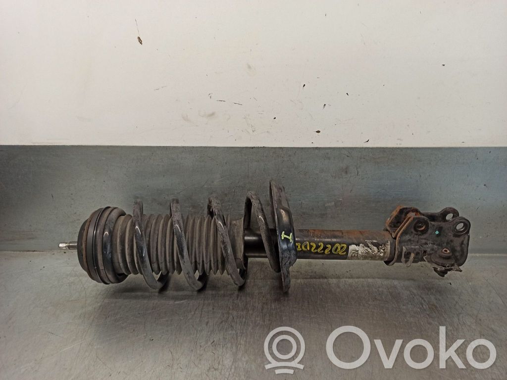 Opel Corsa D Amortyzator osi przedniej ze sprężyną 