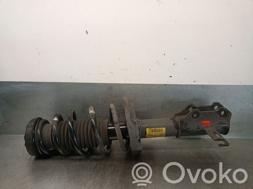 Opel Zafira C Amortyzator osi przedniej ze sprężyną 