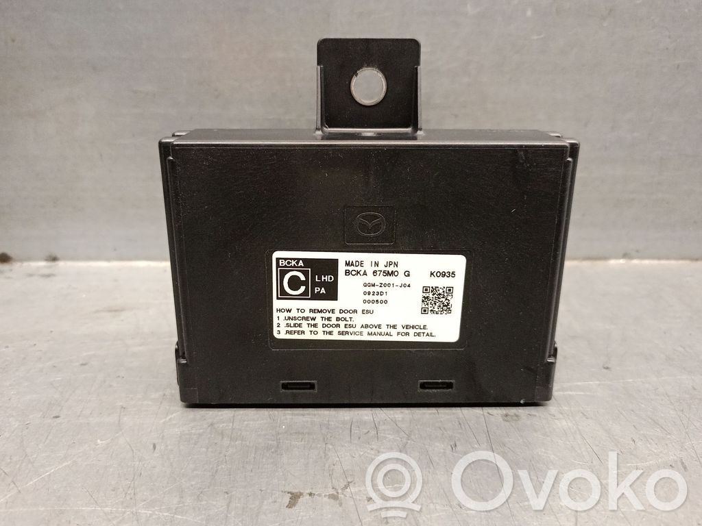 Mazda 3 Module confort 