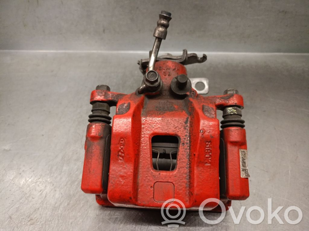 Hyundai i30 Supporto della pinza del freno posteriore 