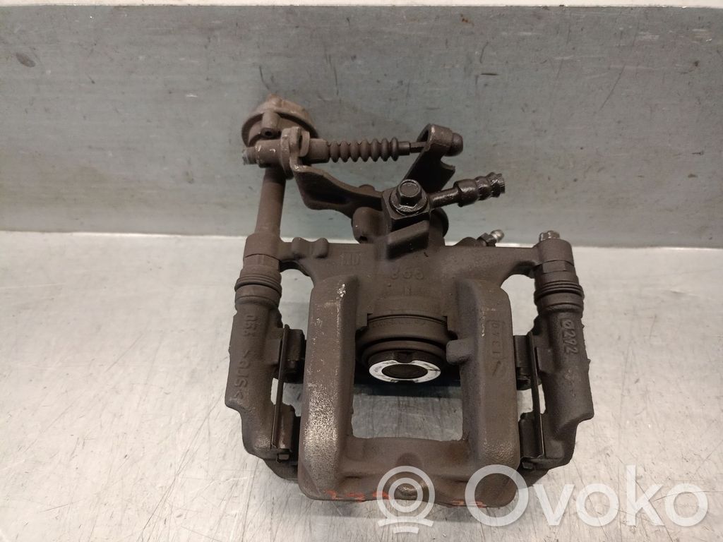 Opel Astra H Mocowanie / Zacisk hamulca tylnego 