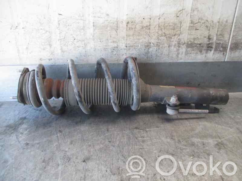 Nissan Primera Front shock absorber with coil spring 