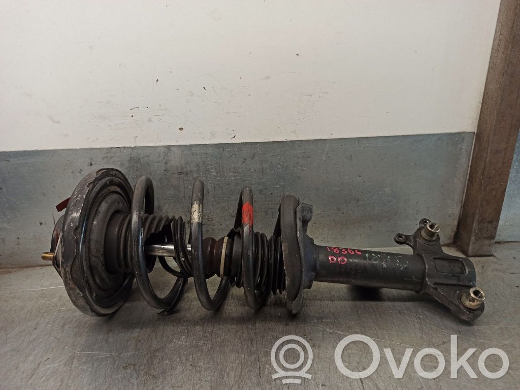 Nissan Primera Amortyzator osi przedniej ze sprężyną 