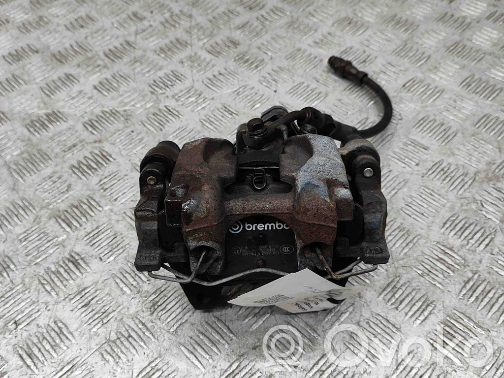 Volkswagen PASSAT B8 Tylny zacisk hamulcowy 