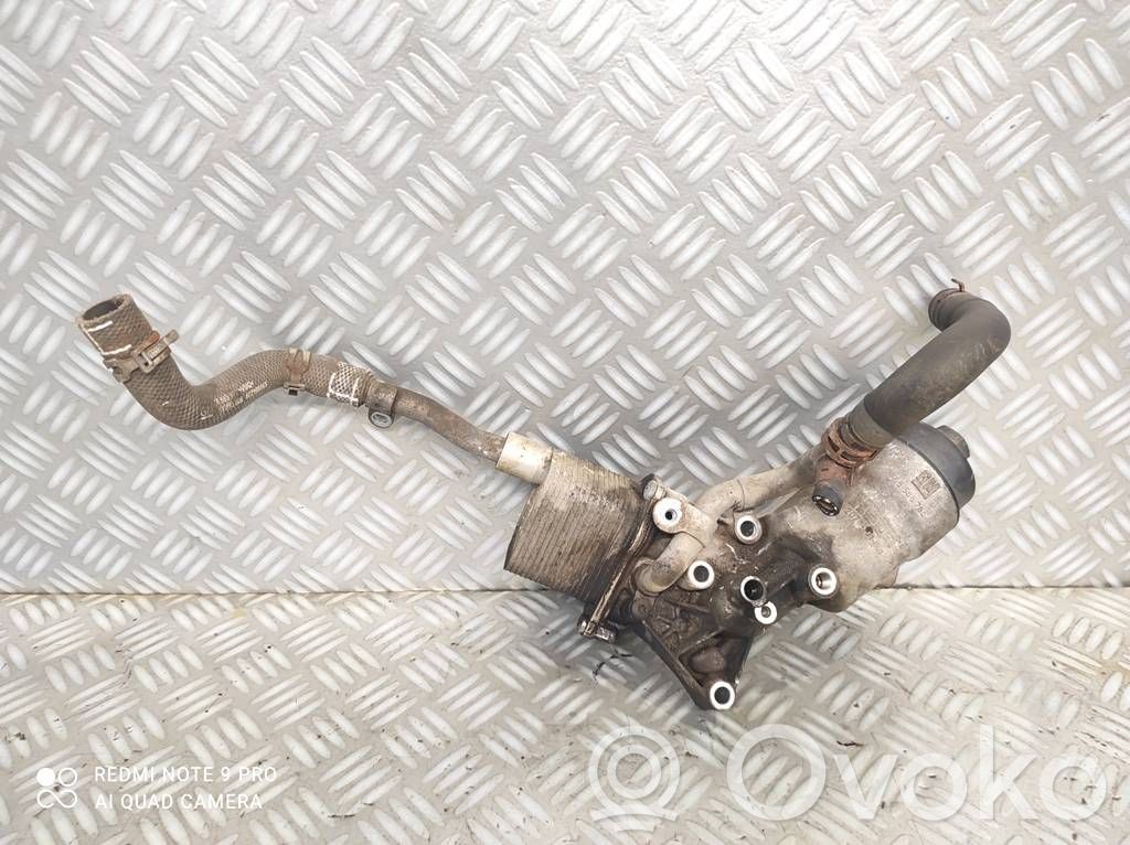 Opel Astra J Mocowanie / uchwyt filtra oleju 
