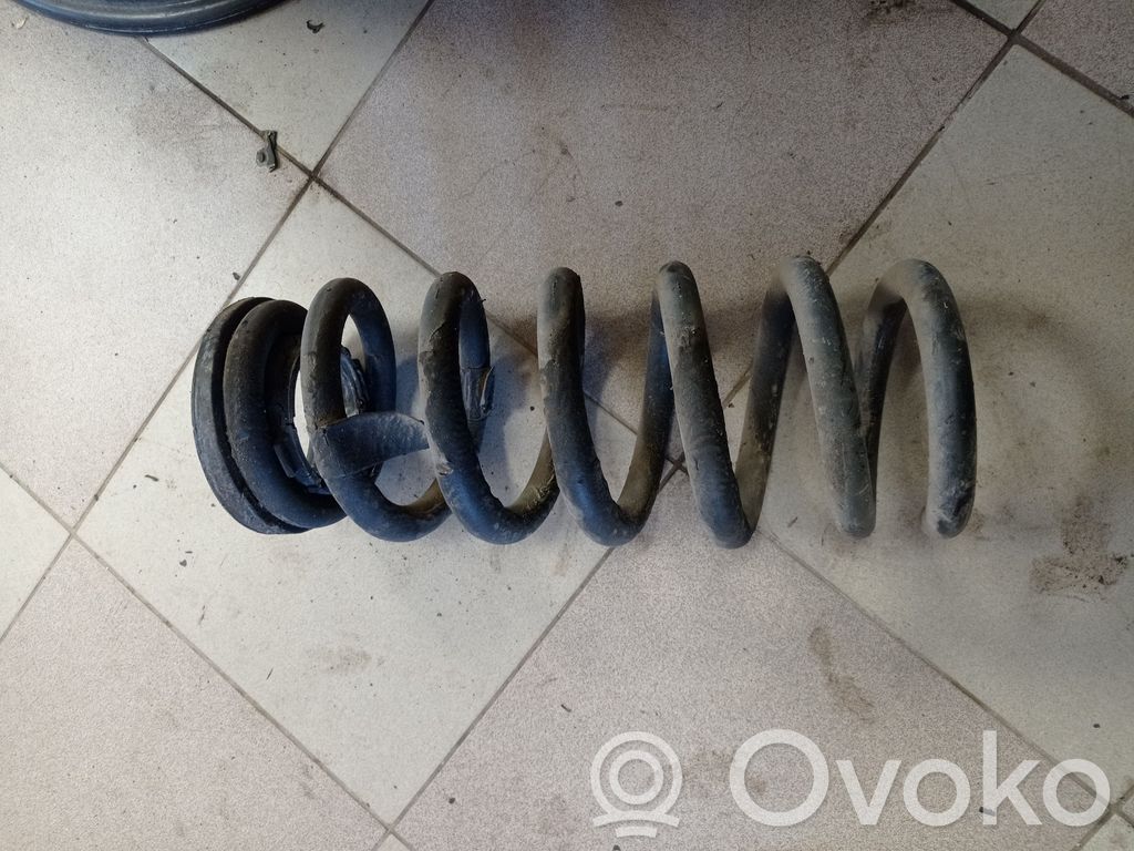 Rear coil spring   E1GC5599AXC,E1GC5599