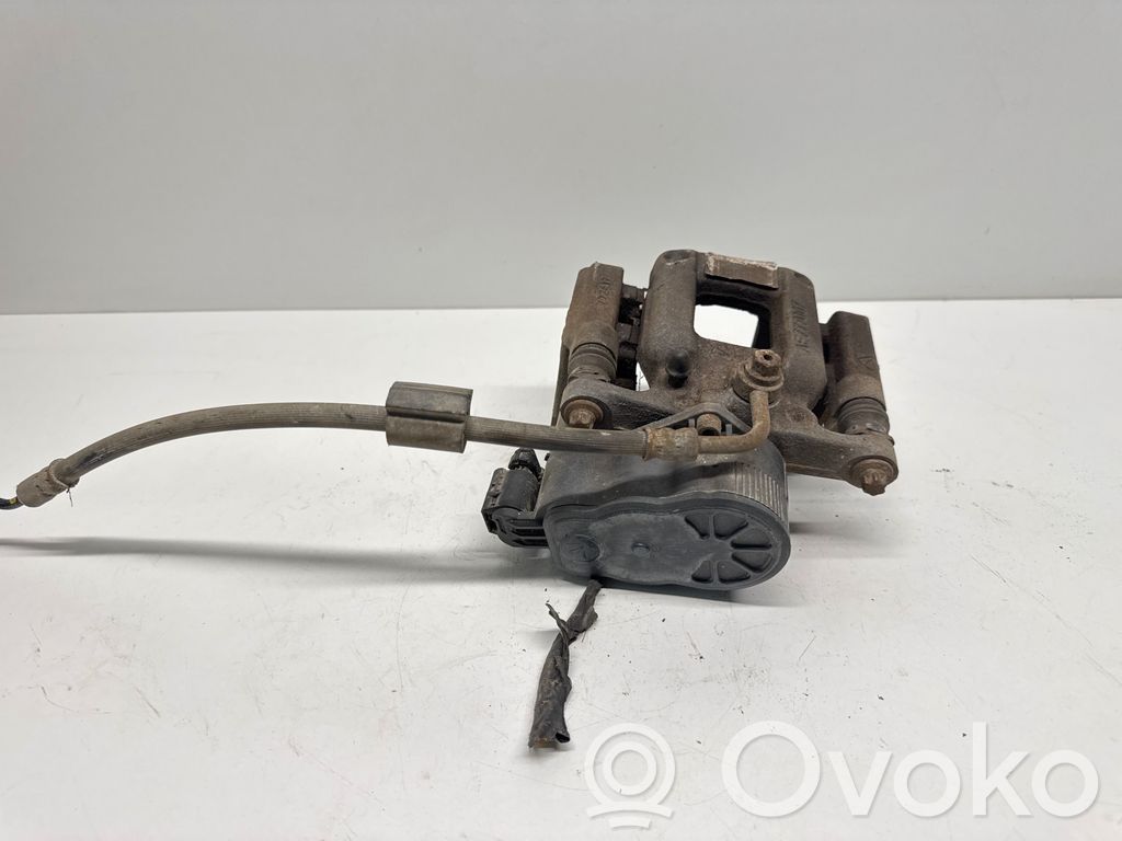 Citroen C4 II Picasso Tylny zacisk hamulcowy 