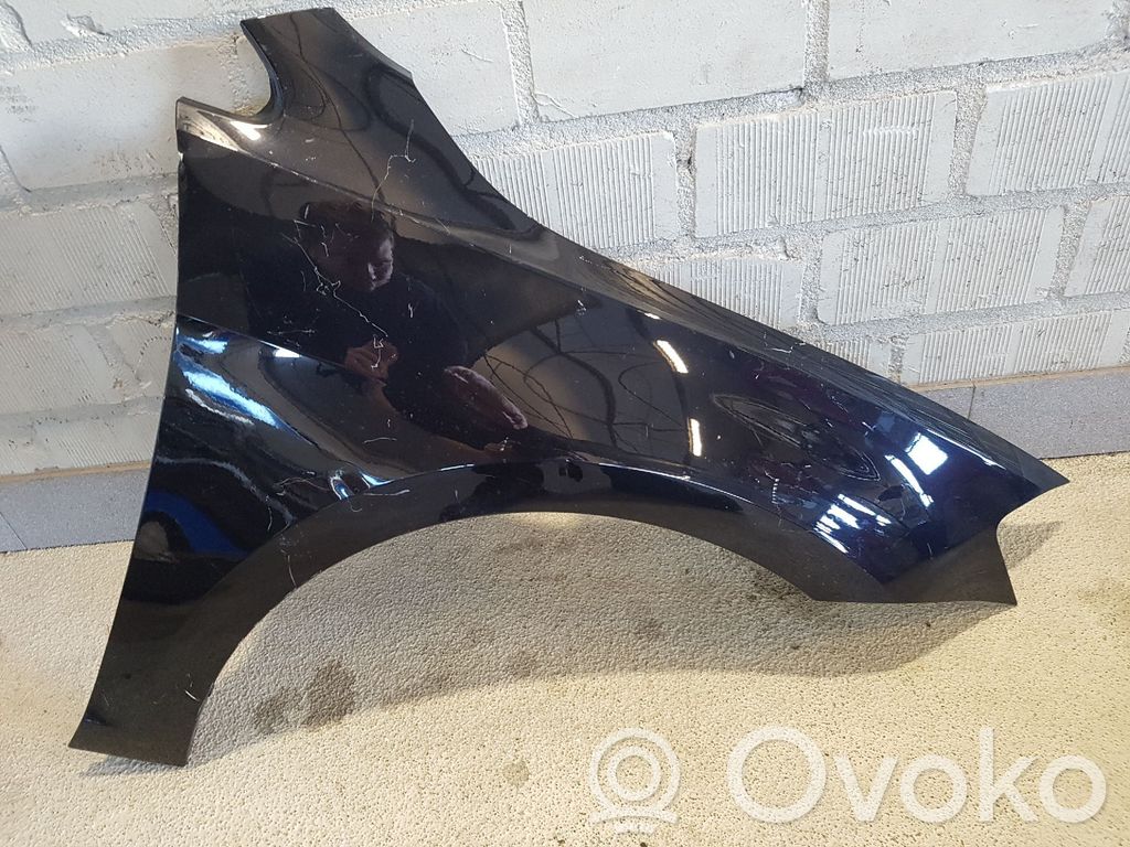 Volkswagen Golf VII Błotnik przedni 