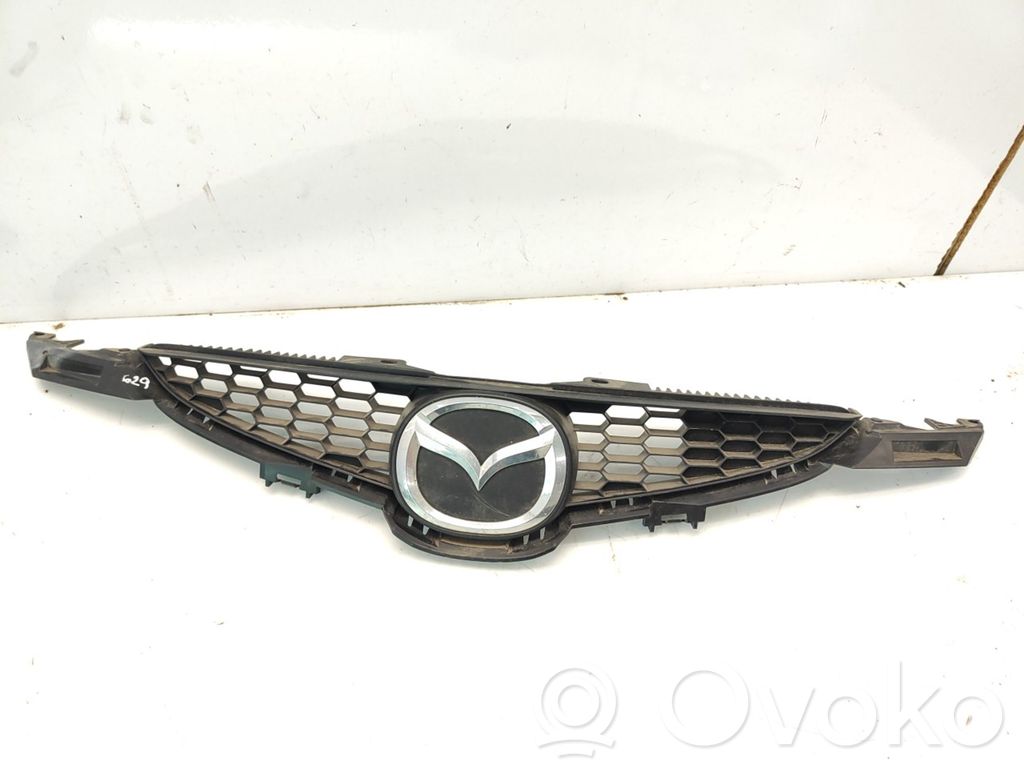 Mazda 2 Front bumper upper radiator grill 