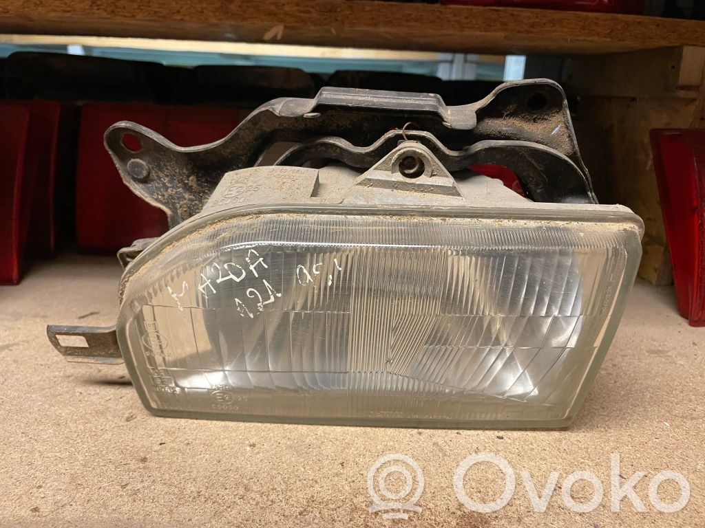 Mazda 121 Headlight/headlamp 
