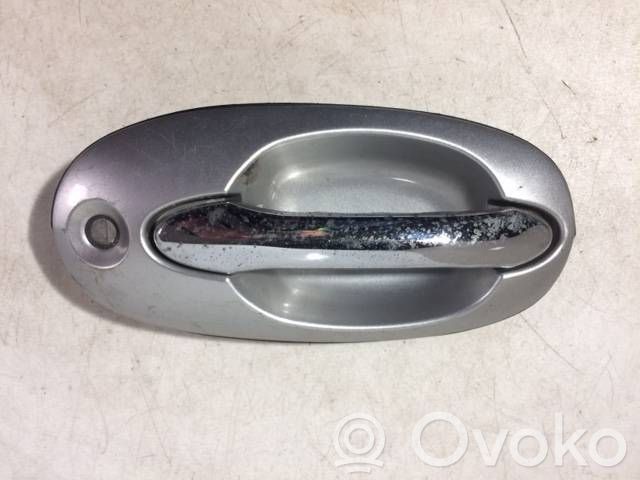 KIA Carnival Manecilla externa puerta delantera 