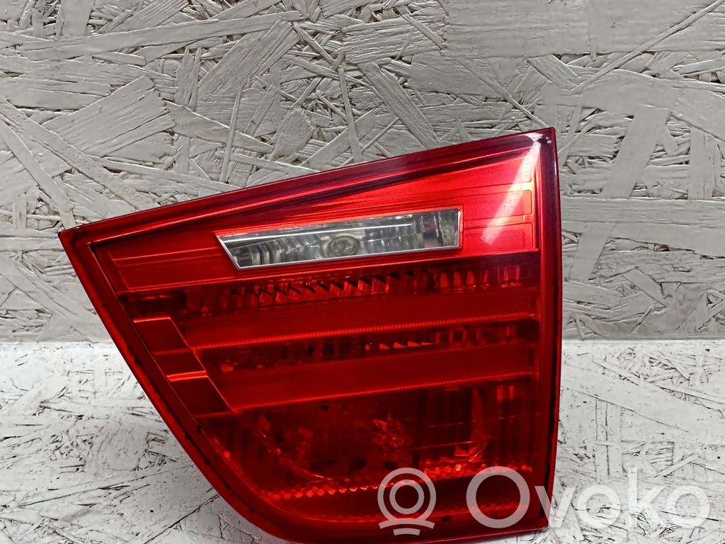 BMW 3 E90 E91 Aizmugurējais lukturis pārsegā 
