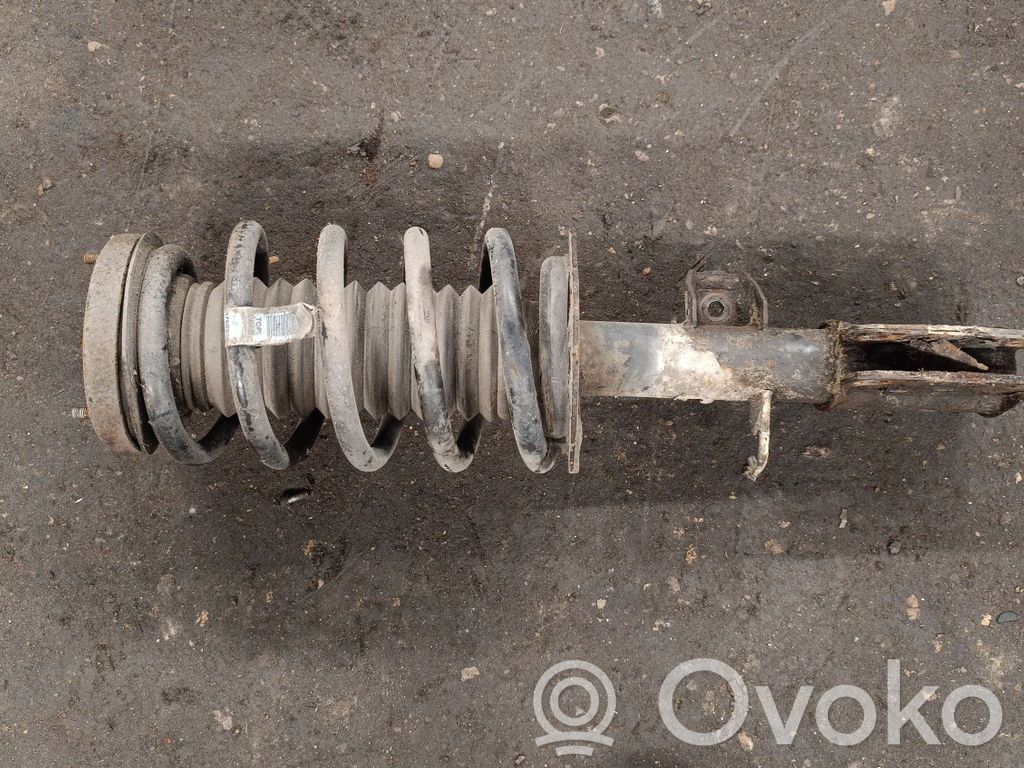 Front shock absorber with coil spring   6764602