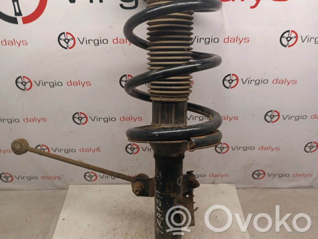 Front shock absorber with coil spring