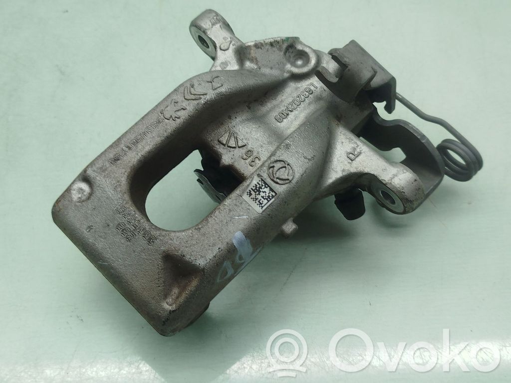 Opel Corsa F Mordaza caliper del freno trasero 