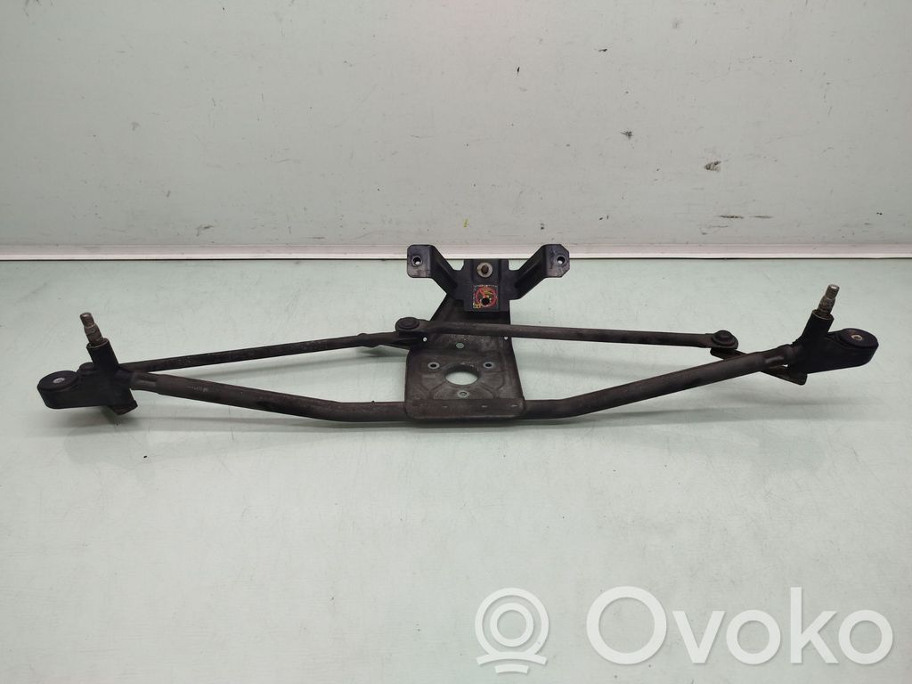 Front wiper blade arm