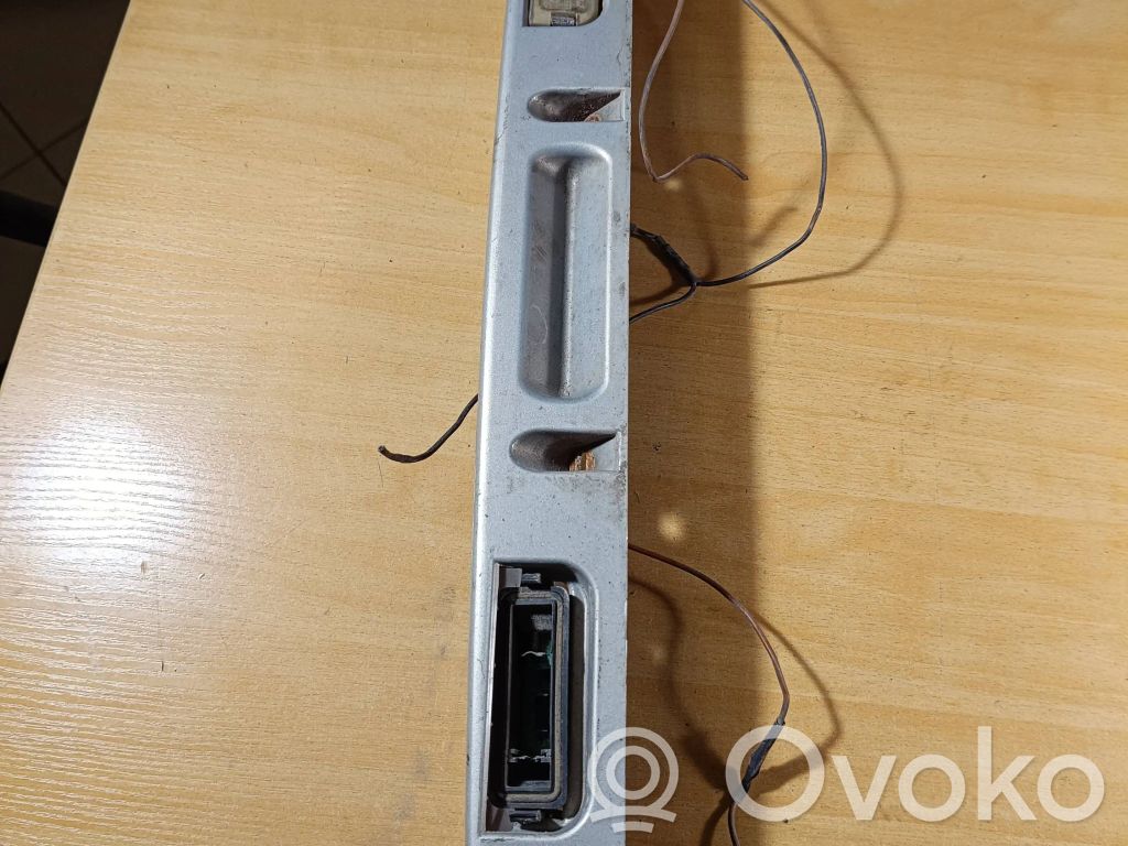 Chrysler Voyager Trunk door license plate light bar 