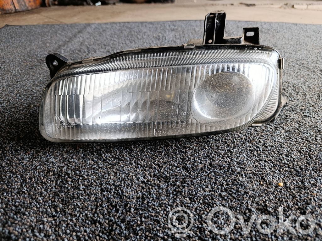 Mazda 323 F Scheinwerfer 