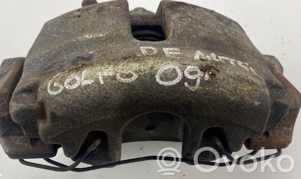 Volkswagen Golf VI Zacisk hamulcowy przedni 