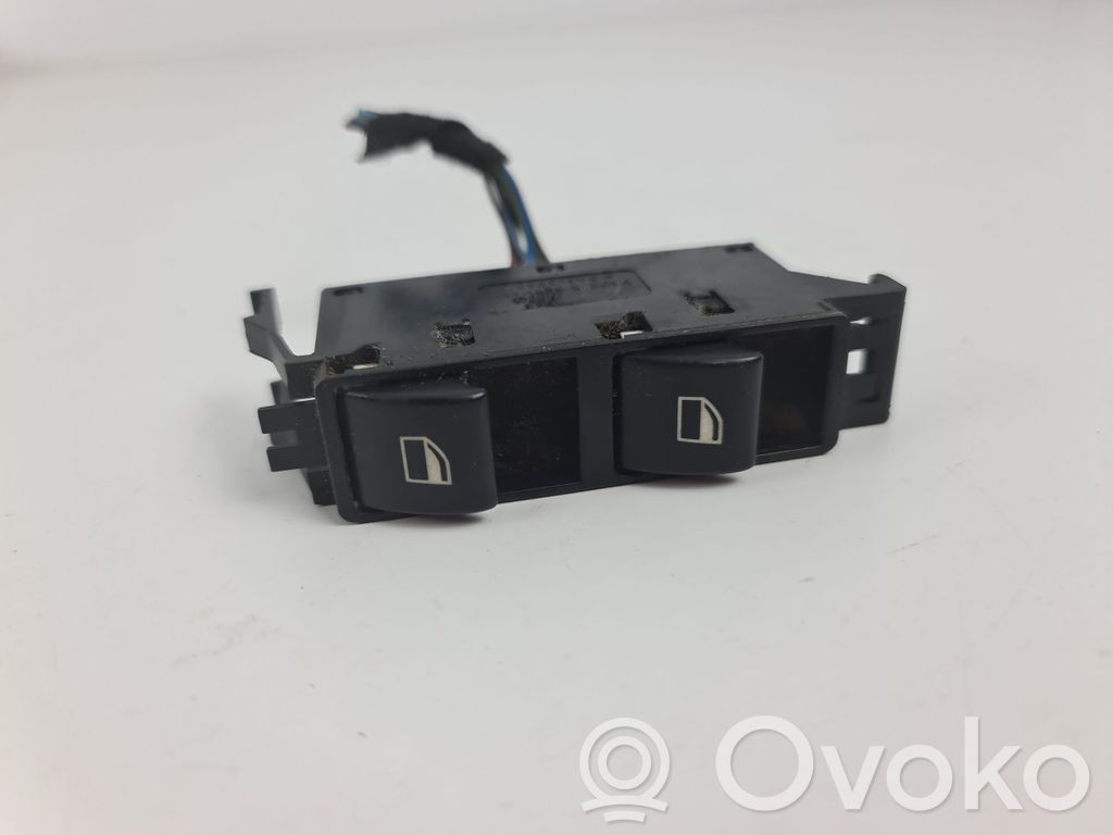 Electric window control switch   6902178