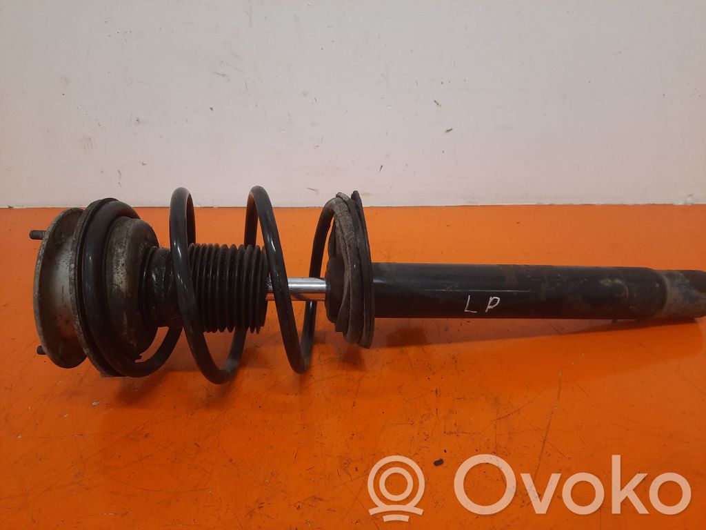 Front shock absorber with coil spring