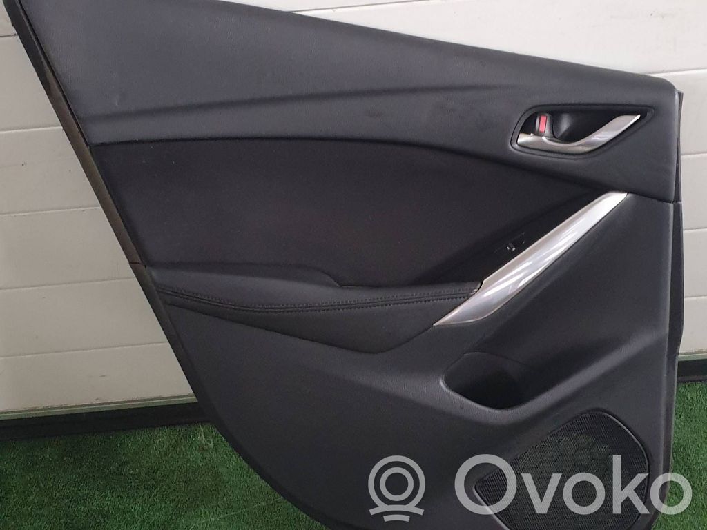 Mazda 6 Takaoven verhoilu 