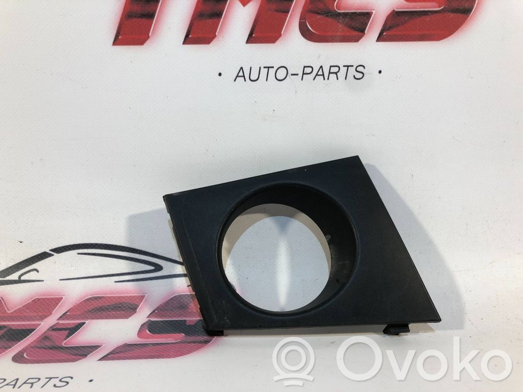 Renault Megane II Moldura/rejilla de la luz antiniebla delantera 