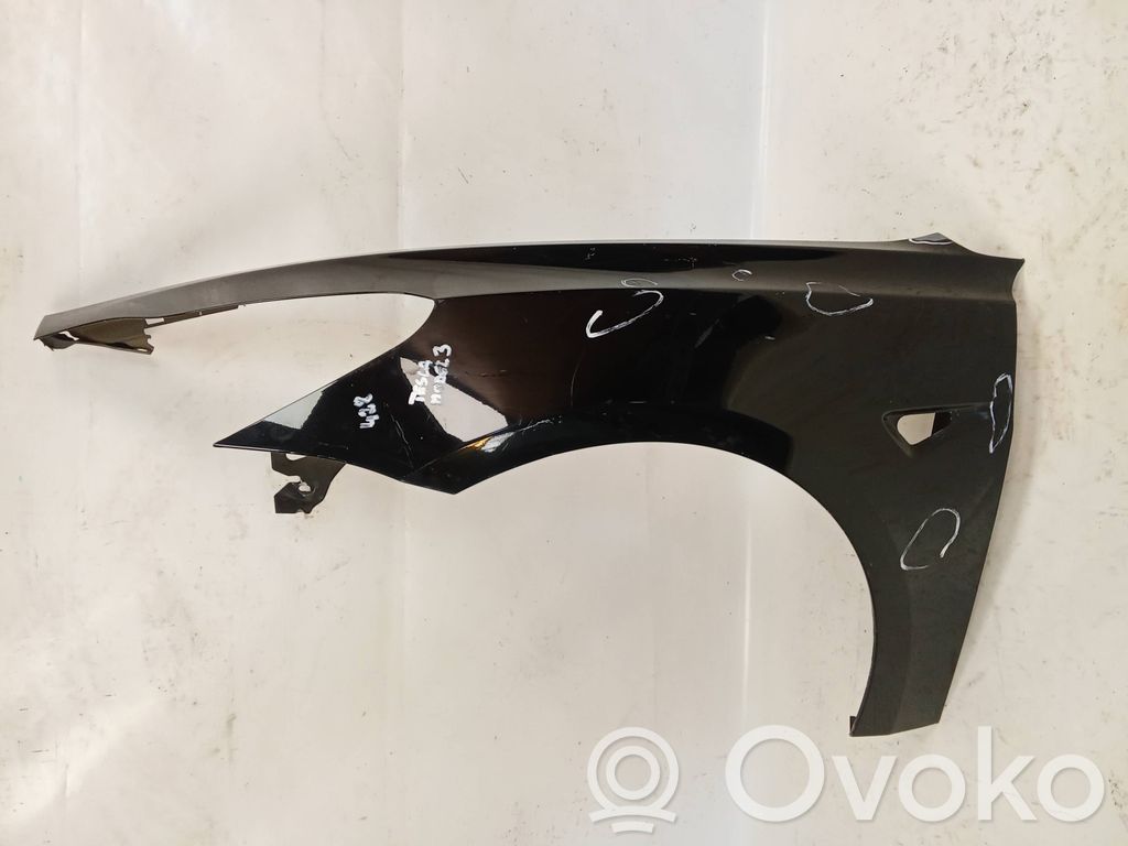 Tesla Model 3 Sparnas 