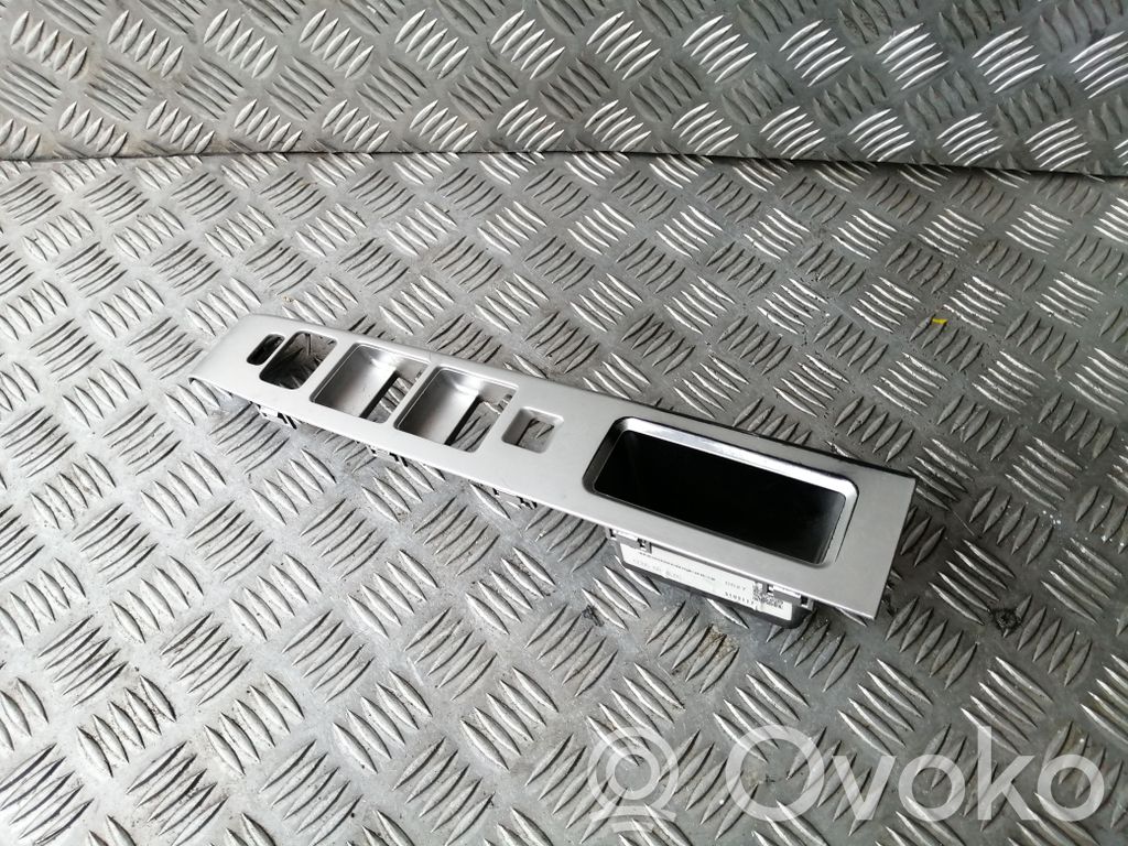 Mazda 5 Front door window switch trim 