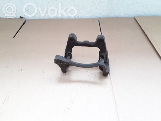 Volkswagen PASSAT B7 Brake caliper pad carrier rear NOCODE