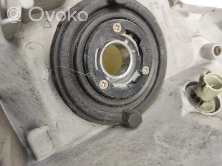 Toyota Corolla Verso E121 Lampa przednia 9922679004