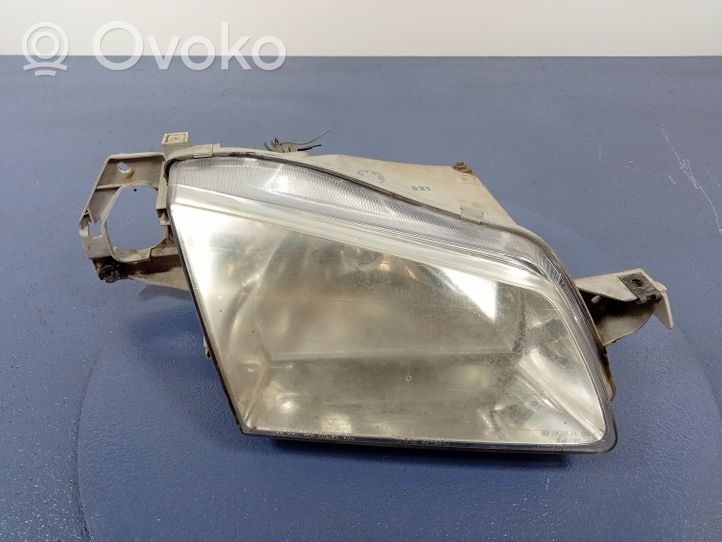 Mazda 323 Lampa przednia 20-5571