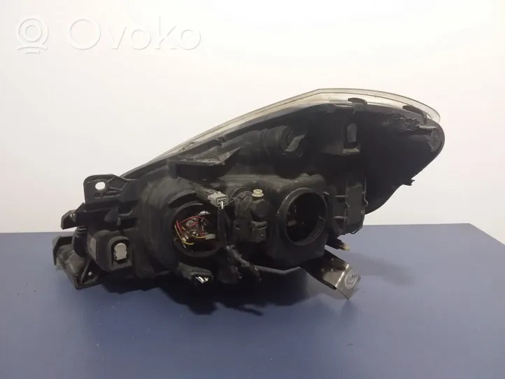 Renault Clio III Phare frontale 7701070492