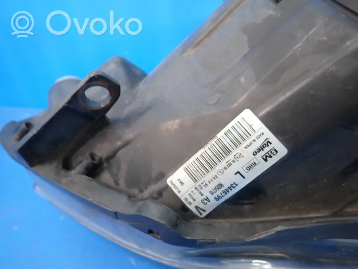 Opel Corsa D Lampa przednia 13446799