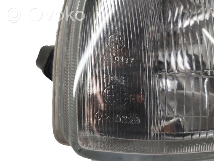 Volkswagen Golf III Lampa przednia 21950402