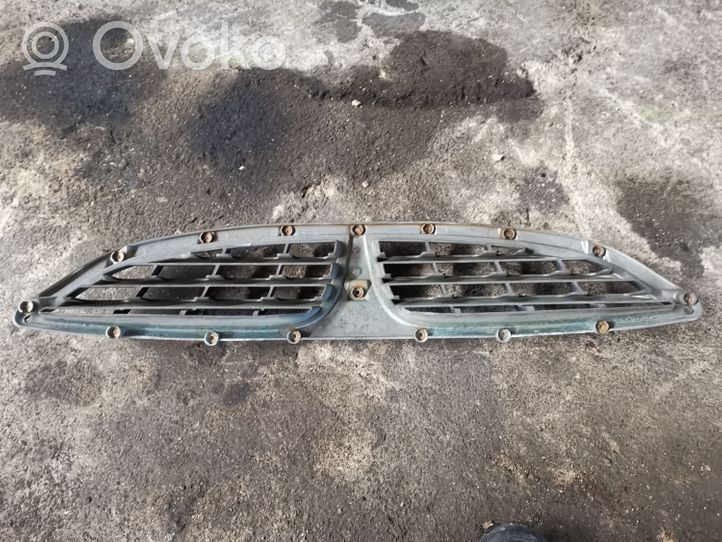 SsangYong Kyron Grille calandre supérieure de pare-chocs avant 7945109000