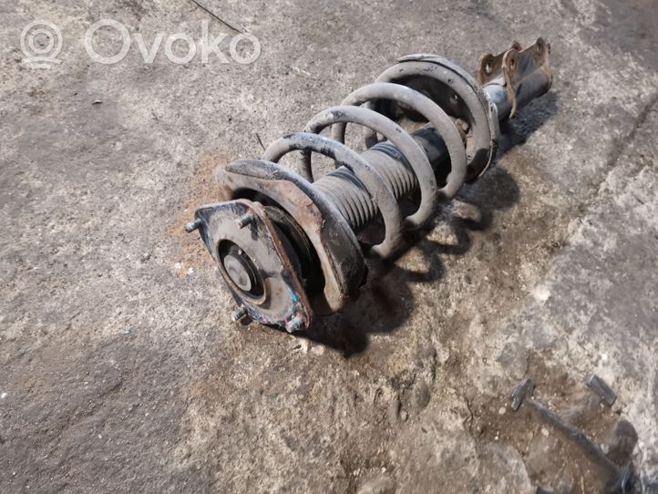 KIA Carnival Front shock absorber with coil spring 