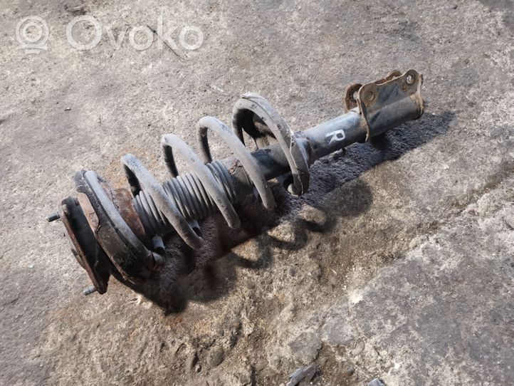 KIA Carnival Front shock absorber with coil spring 