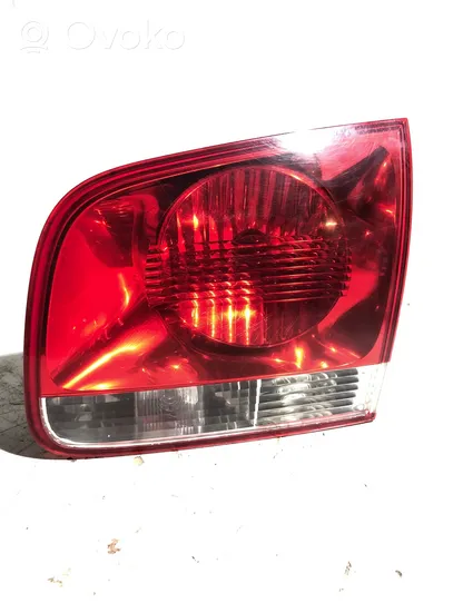 Volkswagen Touareg I Lampy tylnej klapy bagażnika 7l6945094H