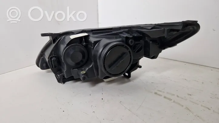 Saab 9-3 Ver2 Lampa przednia 12770150