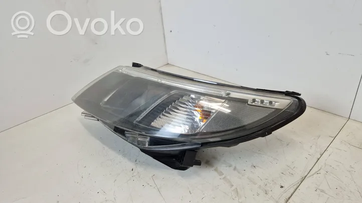 Saab 9-3 Ver2 Lampa przednia 12770137