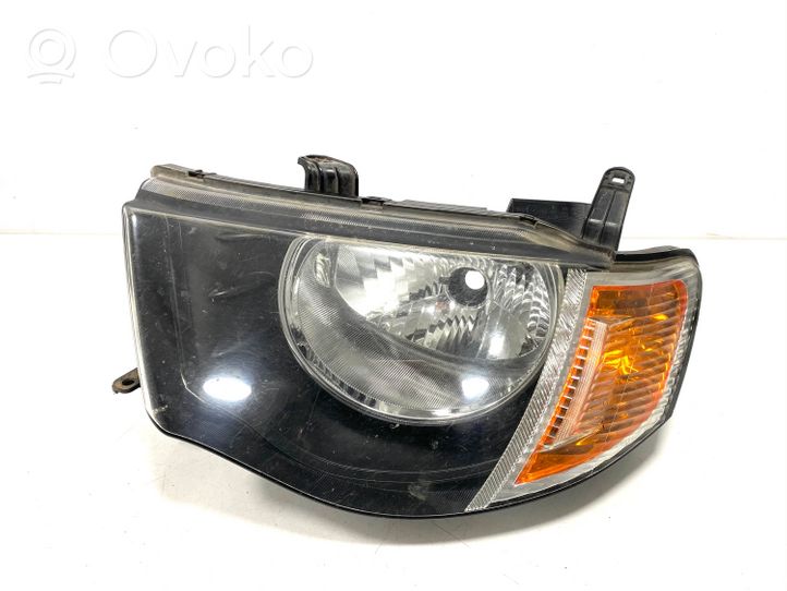 Mitsubishi L200 Lampa przednia 90736300