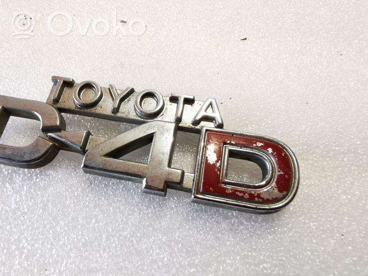 Toyota Corolla E120 E130 Emblemat / Znaczek tylny / Litery modelu 