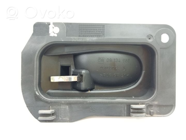 Opel Vectra B Klamka wewnętrzna drzwi przednich 09134968