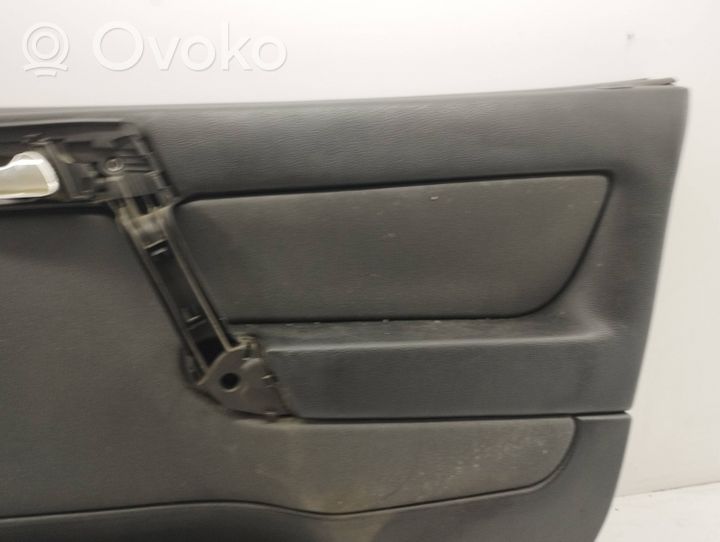 Opel Astra G Garniture de panneau carte de porte avant 013112794